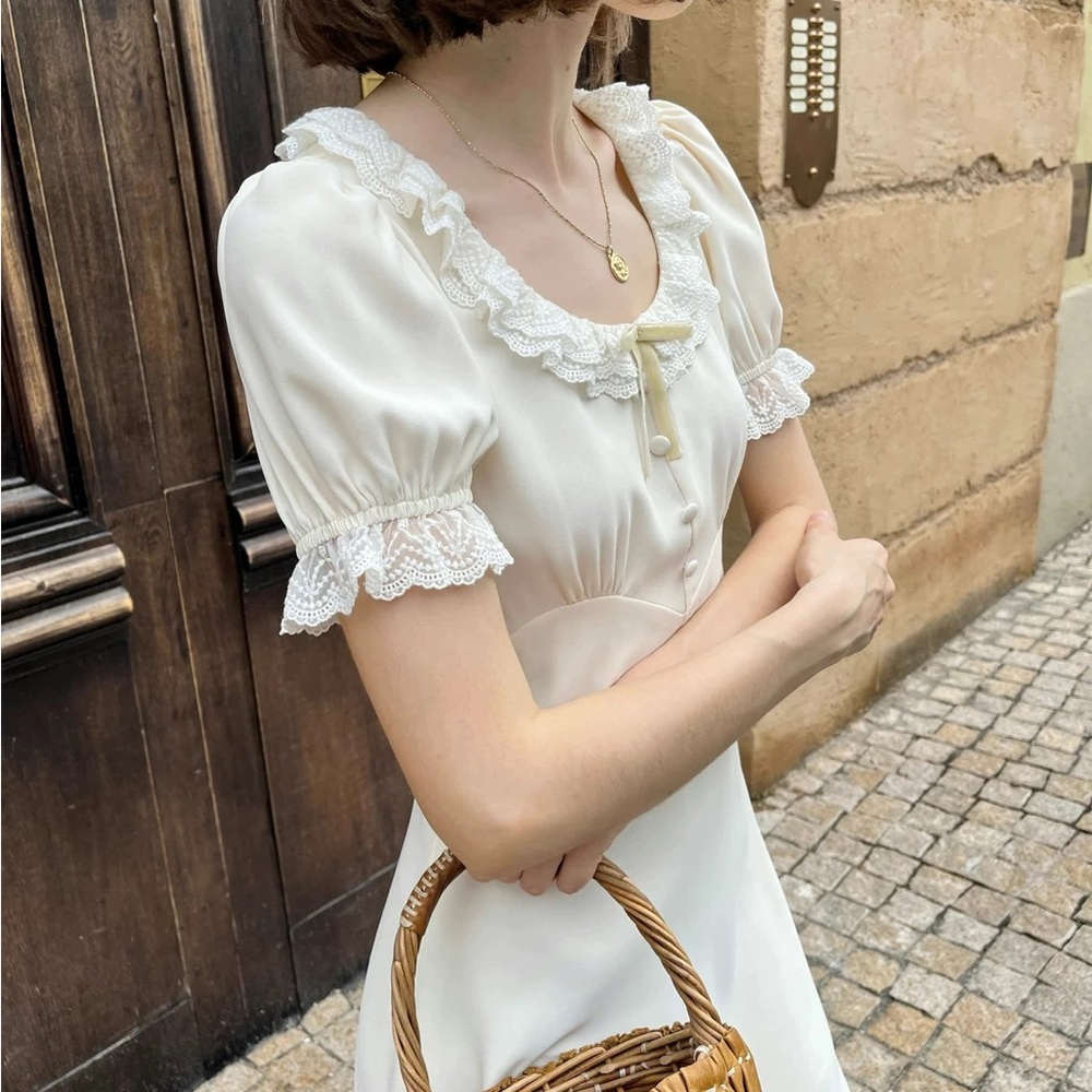 Elegant White Dress with Lace Details